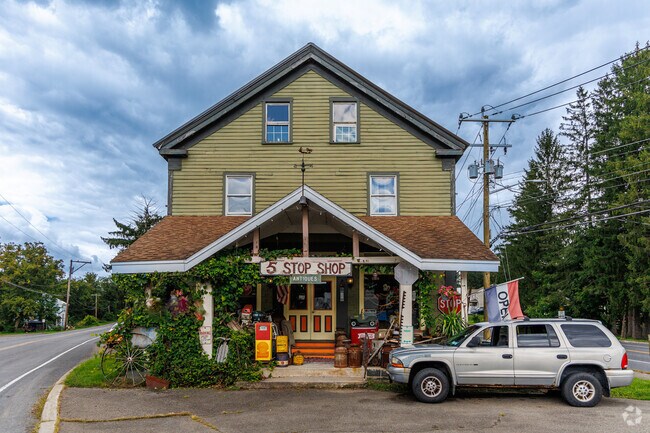 The 5 Stop Shop stands at McLean’s five‑corner crossroads with antiques and curios.