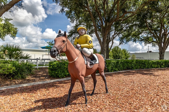 A jockey statue near the Lexington Oaks entrance nods to the community’s equestrian roots.