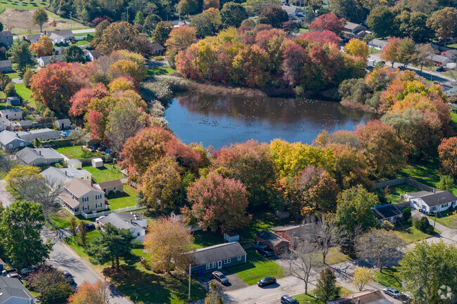 Homes surround Leahy's Pond in the Narrows neighborhood making the park an elegant attraction.