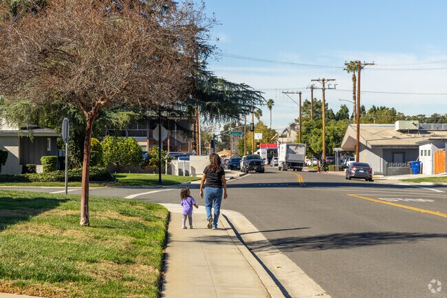 Families enjoy walking the tree lined residential streets of Magnolia Center.