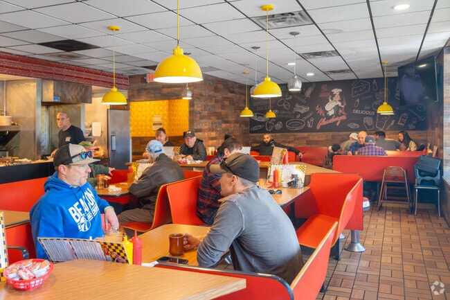 The Flameburger is a little dive restaurant that is open 7 days a week 6 AM to 2 AM.