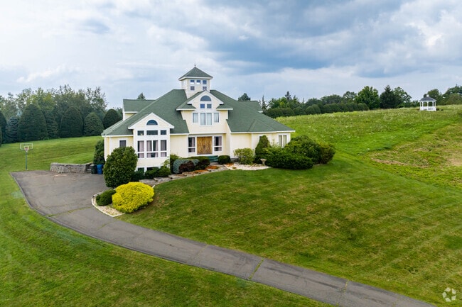 This beautiful hilltop home in Berlin has a great view of the town below.