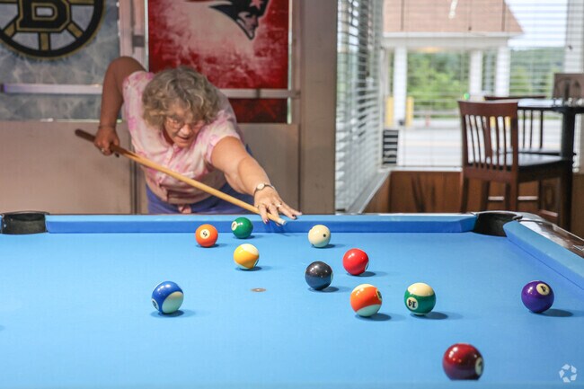 Folks in East Millinocket head down the Hamlet Pub for. a game of pool and a cold beer.