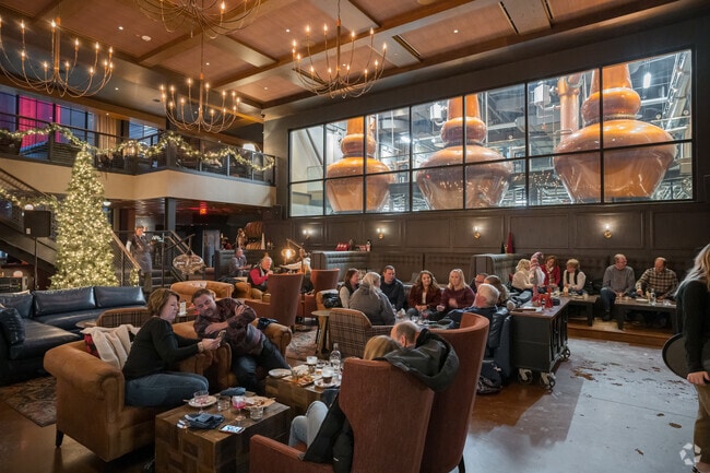 Restaurant patrons inside of the decorated O'Shaughnessy Distillery.