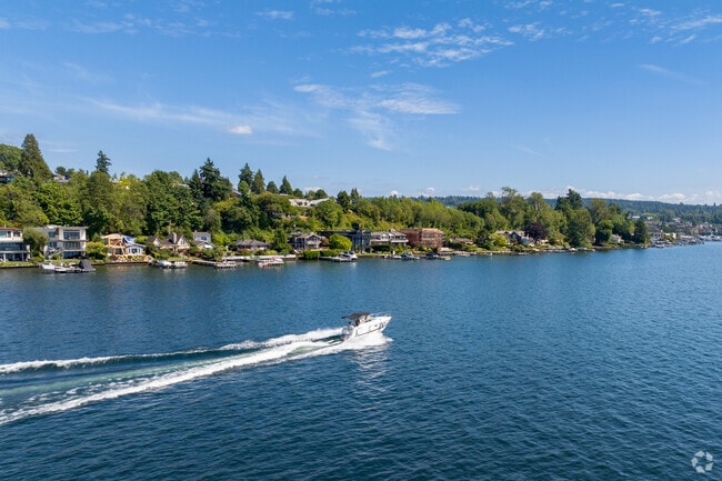 Lake living at its finest in the beautiful neighborhood of Moss Bay.