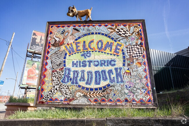 Braddock welcomes visitors with a quirky mosaic sign.