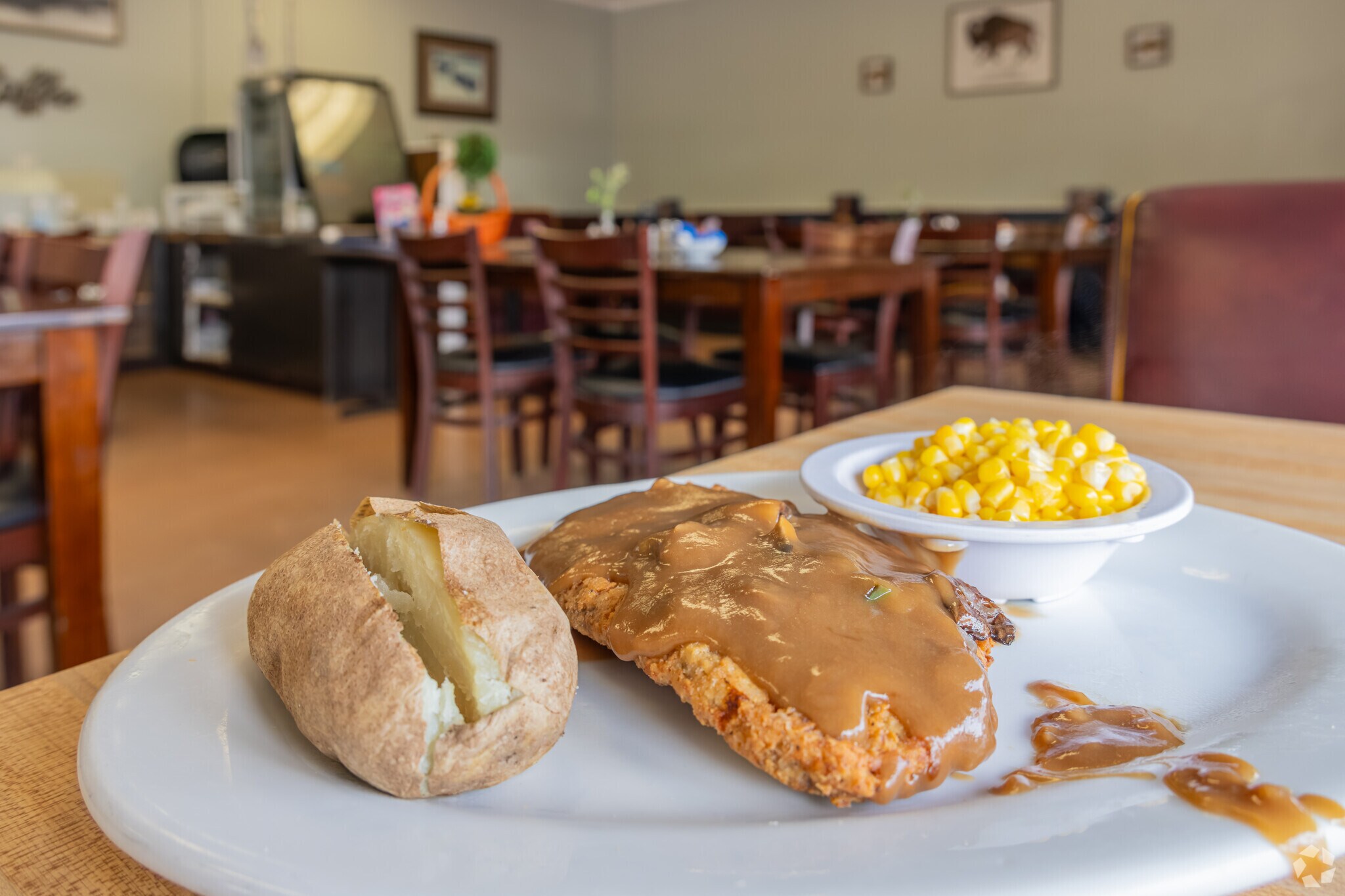 You can enjoy delicious chicken fried steak at Big Buffalo Grill near Sycamore Creek.