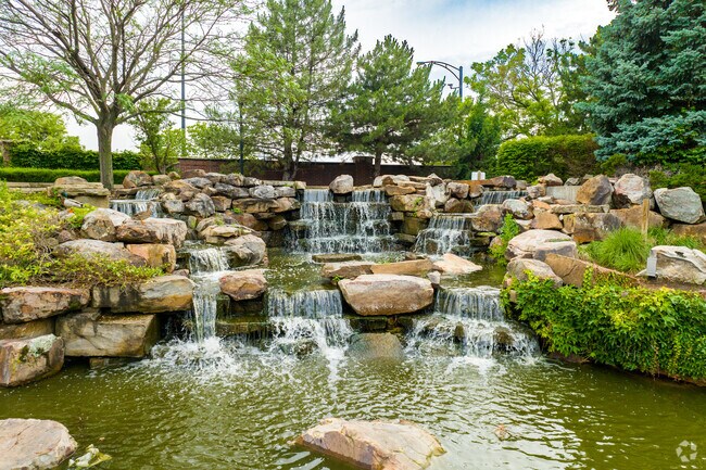 Eastborough Park near Fabrique features a scenic waterfall.