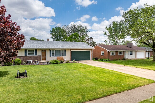 Two-car garages and wide driveways are common for Far Hills' Ranches.