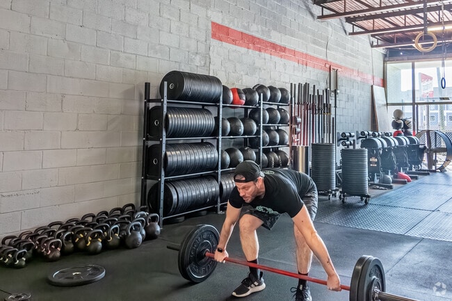 CrossFit ATP is a neighborhood fitness gym in Briarcreek-Woodland, Charlotte.