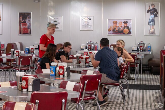 Near the Village of Amelia, Johnny Rockets serves burgers and fries in a vintage environment.