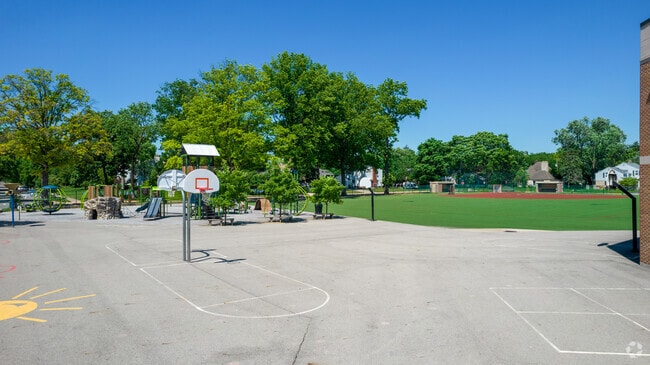 Students can play basketball on the black top at Bexley High School.
