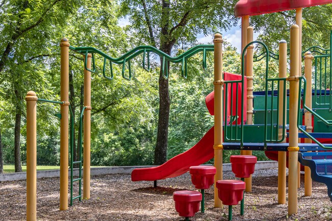 Little climbers enjoy the jungle gym at Bundrick Park in Fayetteville.