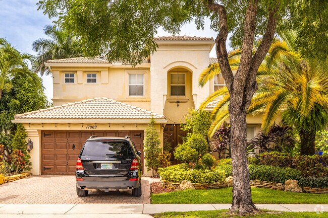 Enjoy your slice of paradise at your new Spanish eclectic home in Silver Lakes!