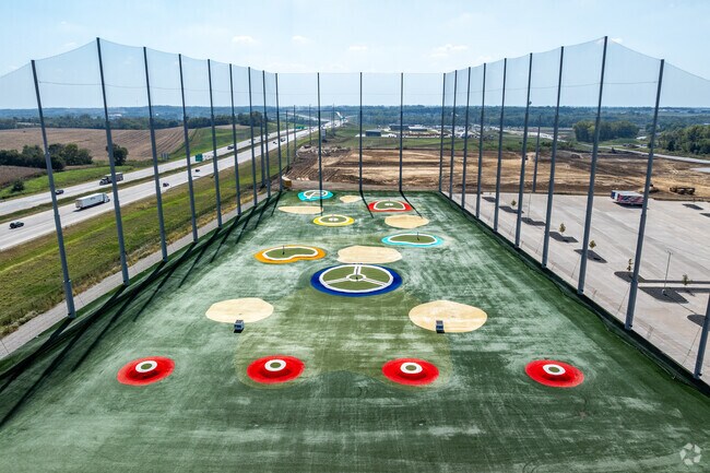 PinSeekers is a golf destination , but also offers a restaurant and bar as well as a bowling alley.