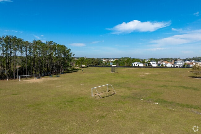 With grass fields to play on, Sawgrass Bay Elementary School  students have plenty of play space