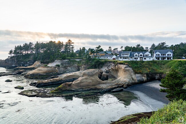 Beautiful homes sprinkle the cliffs of  Little Whale Cove.