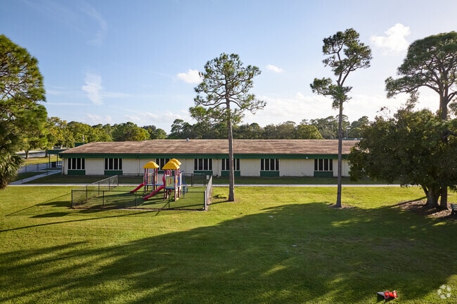 Village Green Elementary School has a smaller fenced in playground for younger children.
