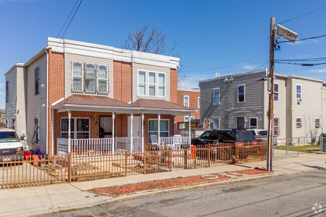 Find numerous brick and stucco-clad row houses along with twin duplexes in Liberty Park.