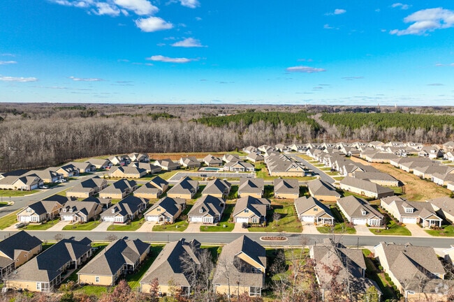 A sea of new homes stretches across the edge of Gibsonville’s growing suburbs.