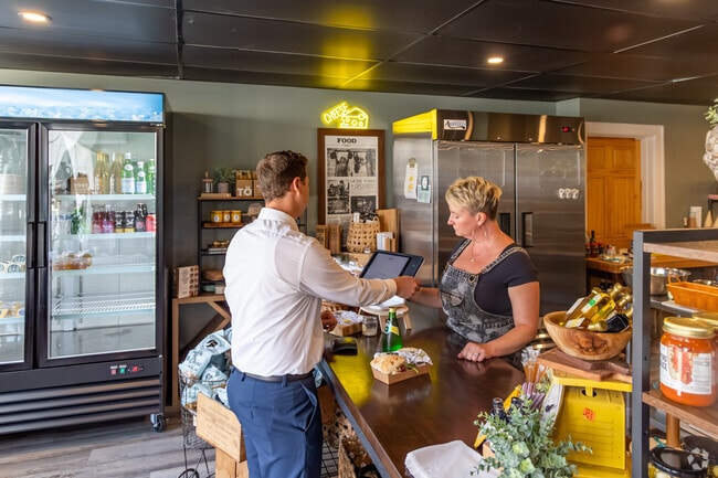 Mount Oliver folks visit The Cheese Queen for local products in Mount Oliver Borough.