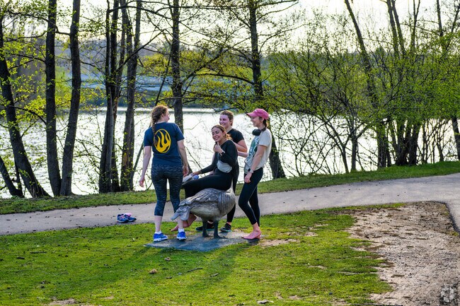 A group of runners take a break in Gallop Park, close to Tuomy Hills.