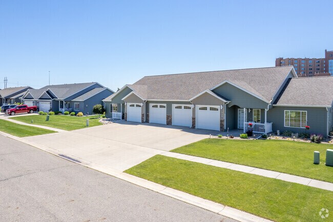 Explore the picturesque row of twin homes in Burlington, offering stylish living.