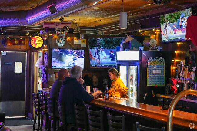 Friends come together at The Checkerboard in Central to have a drink and watch sports.