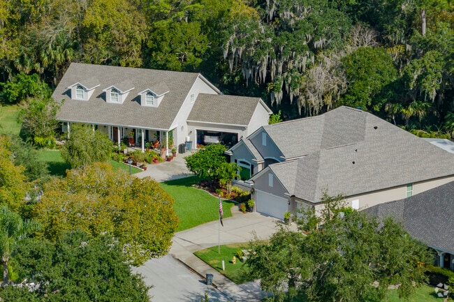 This row of homes in Lakevue is surrounded by mature trees.