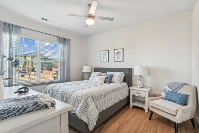 Oversized Bedrooms with Wood Inspired Flooring