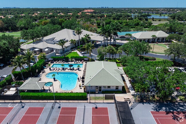 Cypress Woods has a large clubhouse with amenities, including tennis courts and swimming pools.
