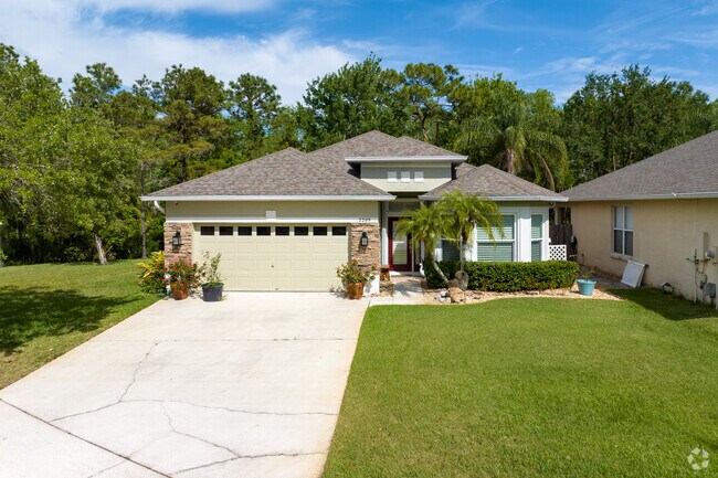 A midsized traditional home in Cypress Springs.