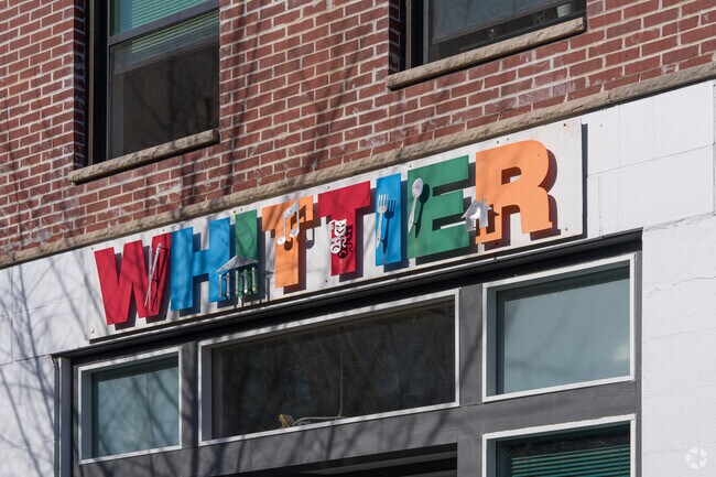 A sign for the Whittier neighborhood association.