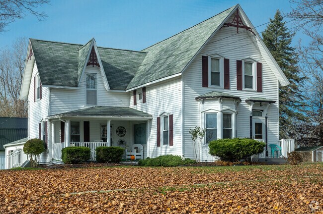 Older gable-front-and-wing farmhouses still stand proudly in Burlington Township, Clifford, Michigan.