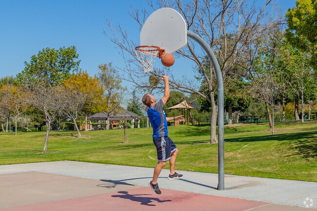 Get in a game of hoops at Ronald Regan Park.
