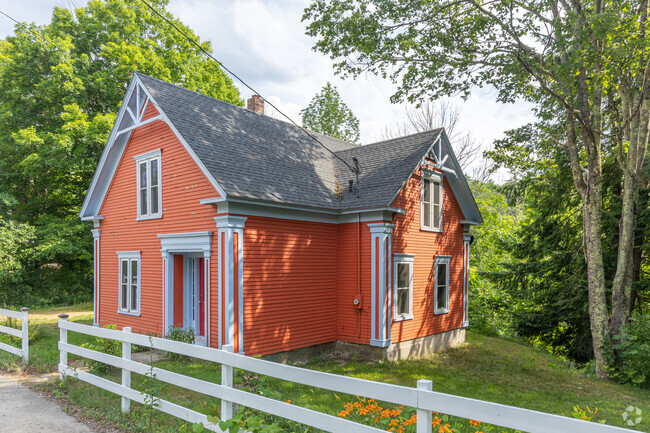 A colorful Traditional New England styled home in the Gilmanton, NH neighborhood.