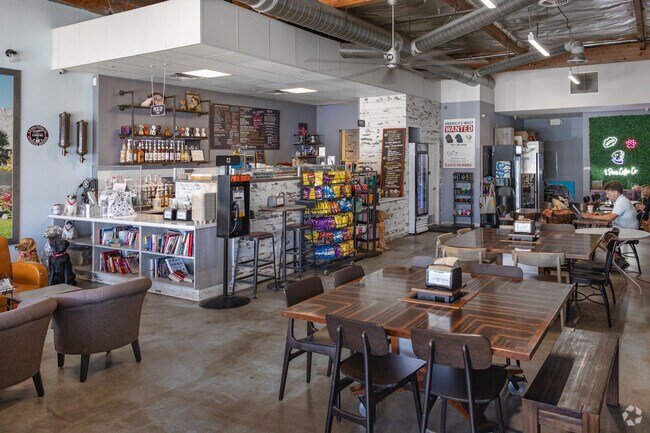 Meet a friend for coffee at 4 Paws Coffee Co in the Racquet Club West neighborhood.