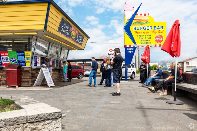 Residents of Roy relaxing and getting a bite to eat at the Burger Bar on a warm spring day.