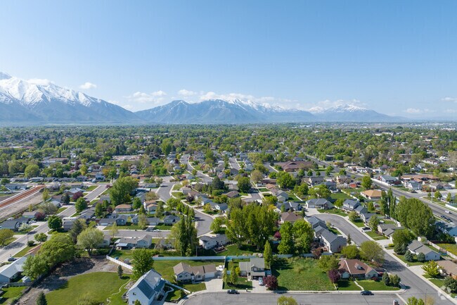 Little Rock Canyon neighborhood sits at the base of the Wasatch Mountain Range, blending tree-lined streets with scenic foothill landscapes in Springville, Utah.