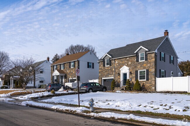 Colonial homes with stone features are common on the residential streets of Morton.