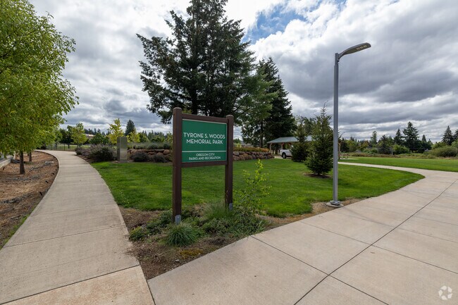 Stroll along peaceful paths at Tyrone S. Woods Memorial Park, located near Gaffney Lane.