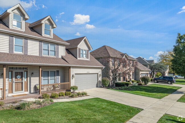 New traditional homes with attached garages dominate the community in Waubonsee.