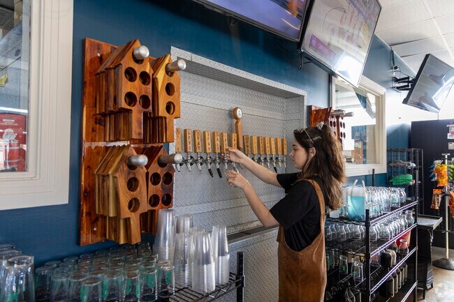 Craft beer enthusiasts gather at Pleasure House Brewing in Bayville for flavorful beers.