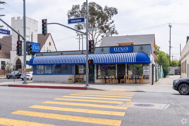 Elena’s colorful wall murals and warm lighting create a welcoming, old-world atmosphere.