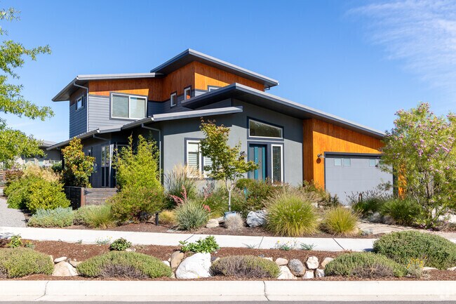 Contemporary homes are popping up around Quiet Village.