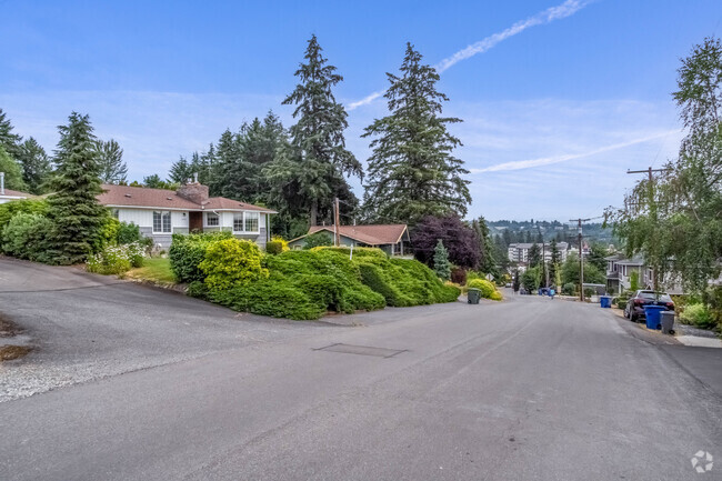 A row of homes in a quiet street in the heart of Kenlake Vista in Kenmore, WA.
