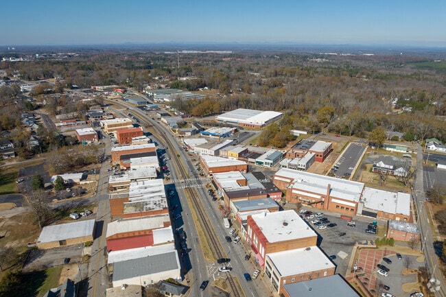 Downtown Commerce exudes a charming small-town atmosphere, with quaint storefronts, friendly faces, and a warm sense of community that invites you to linger.