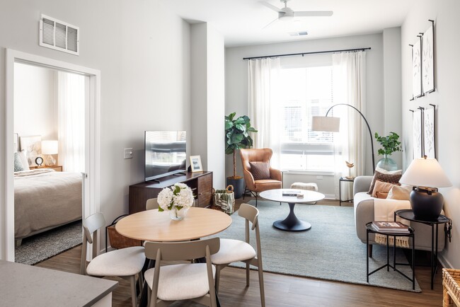 Upgrade Collection living area and dining area with hard surface vinyl plank flooring (Representative photo)
