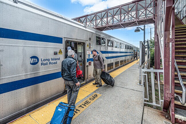 Residents of Downtown Bay Shore use the Bay Shore rail way for their daily commute.
