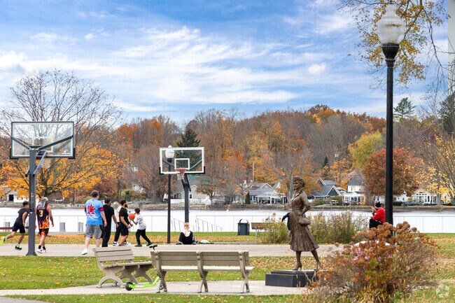 A Lucille Ball statue watches over kids playing in the Lucille Ball Memorial Park in Celoron.